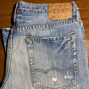 Men’s American Eagle Bootcut Jeans. Size 31x30 slightly distressed with patches